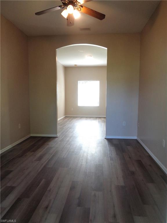View of formal dining room with wood-like flooring accessing the Living Room