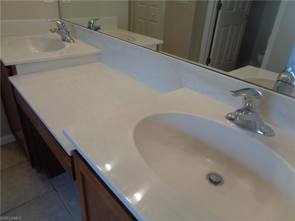 View of the Master Bedroom's bathroom with double sink vanity