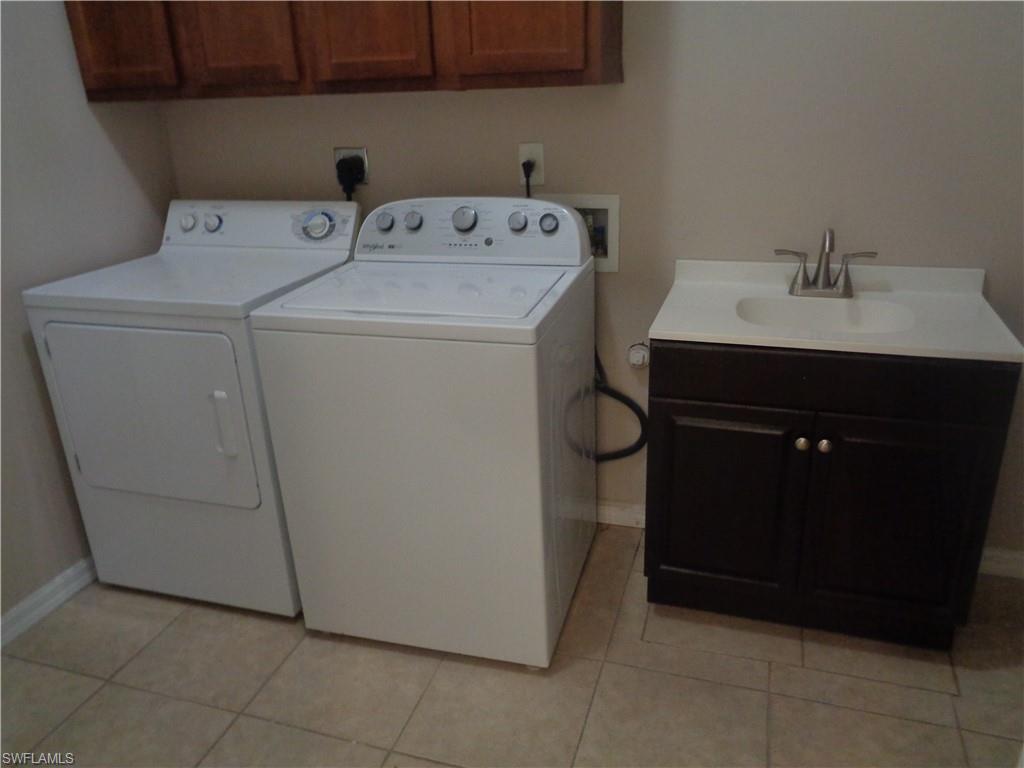 Laundry with Washer & Dryer and hand sink