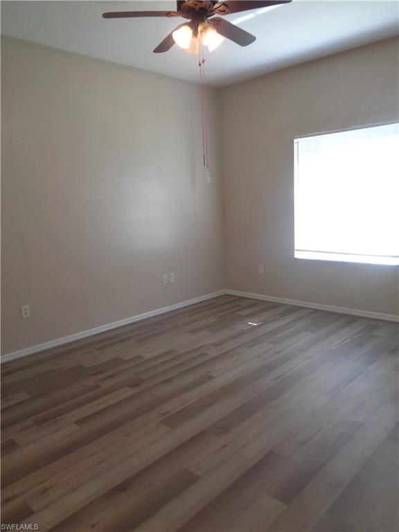 View of the Master Bedroom with wood-like flooring and ceiling fan