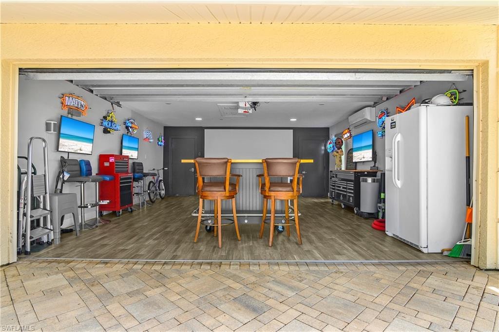 Attached 2 Car Garage with air-conditioning