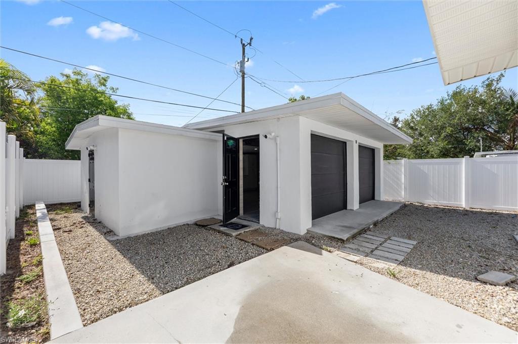 Air-conditioned 2-car garage with full kitchen and bath