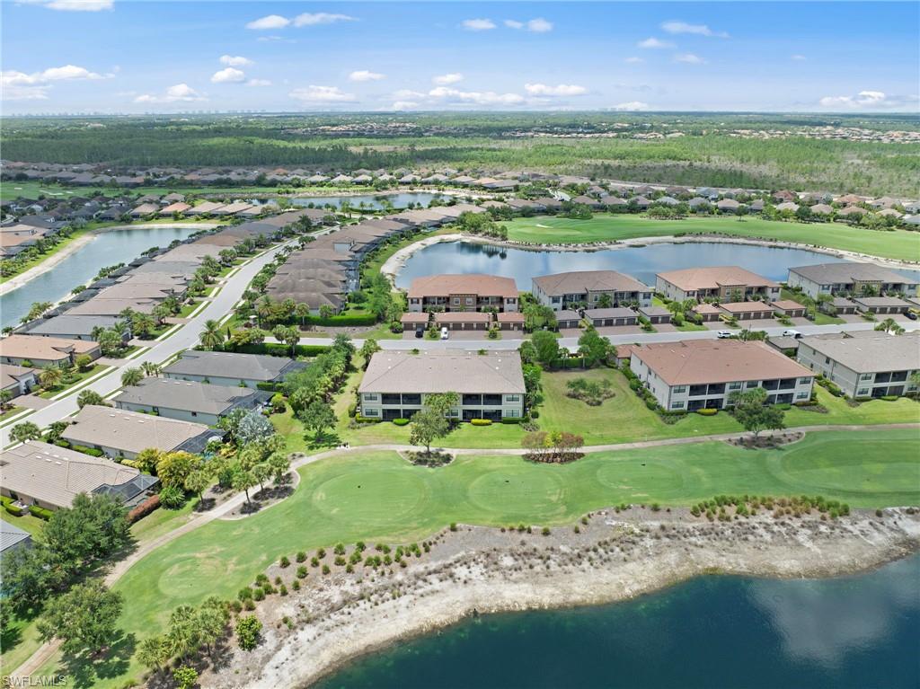 Expansive golf course community featuring numerous water features and established landscaping