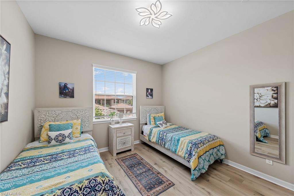 Neutral wall tones and light wood-finish flooring provide a bright interior