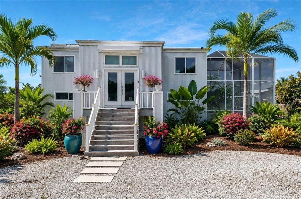 Virtually enhanced (AI)to show front of home with additional landscaping