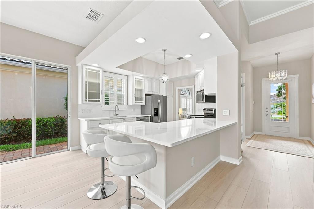 Update and remodeled Kitchen with brand new Quartz Countertops.