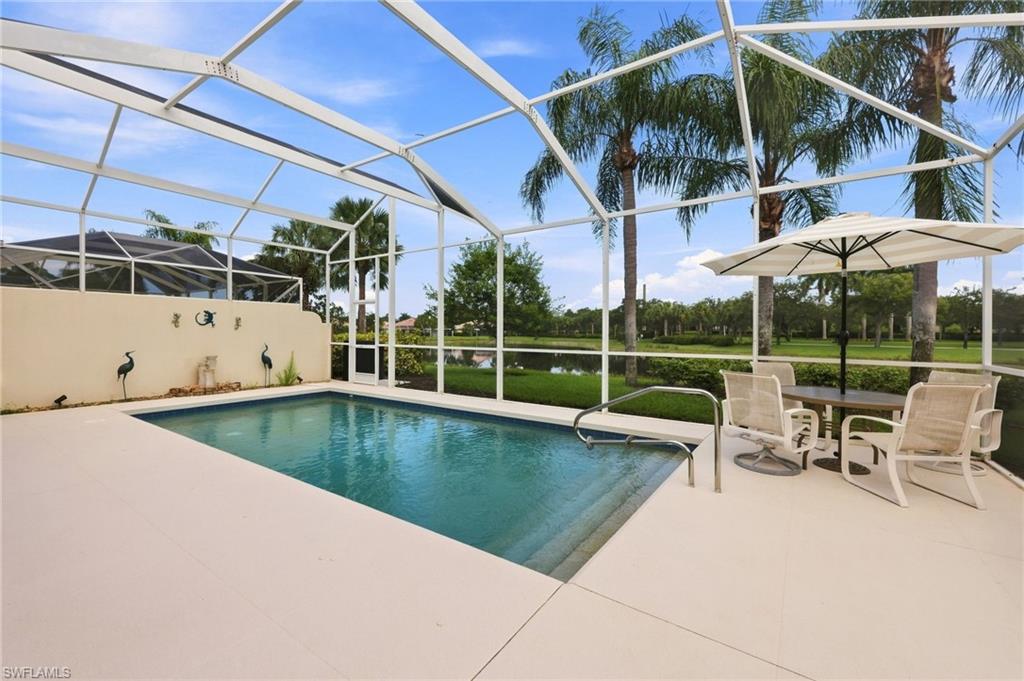 Fully screened-in Pool deck with Lake views and Privacy wall