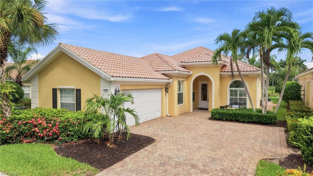 Oakmont Model with Pool, side entry garage and paved driveway
