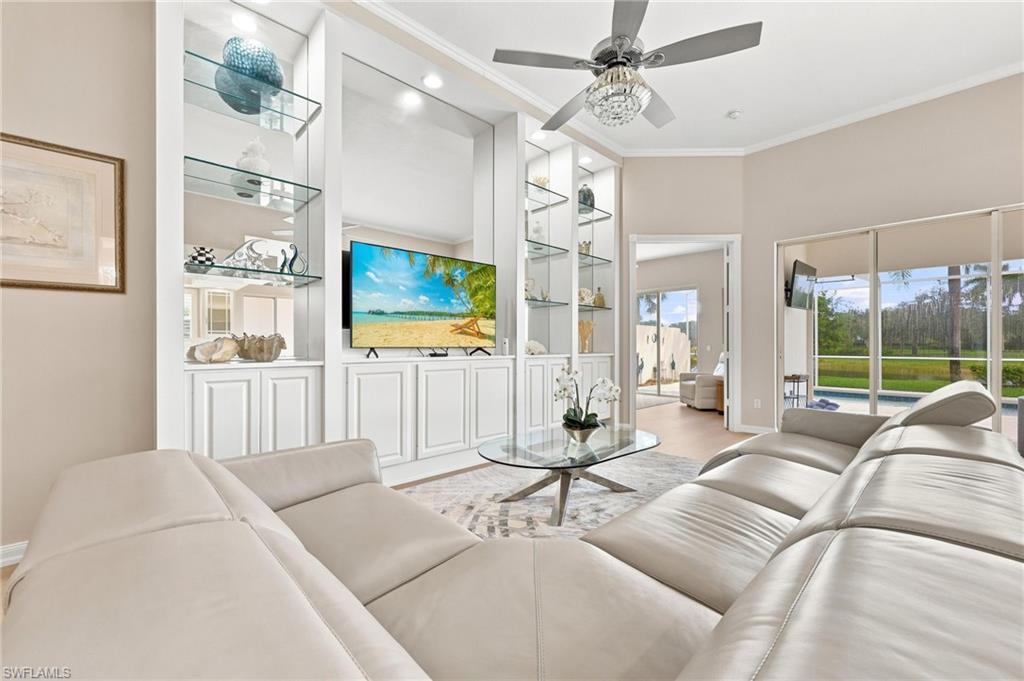 Living Room with access to Master Bedroom and outdoor Pool Deck