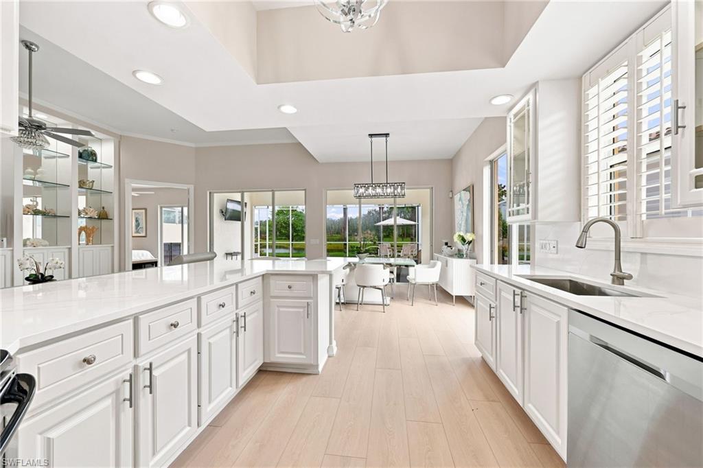 Updated and remodeled Kitchen with Quartz Countertops, white cabinets and stainless steel Applicances.
