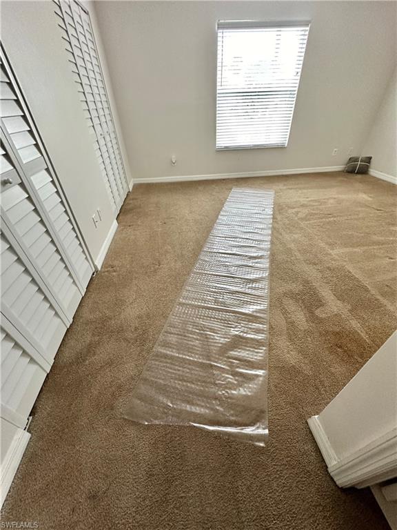 View of Primary Entryway and Front Window and Full Wall Closetry