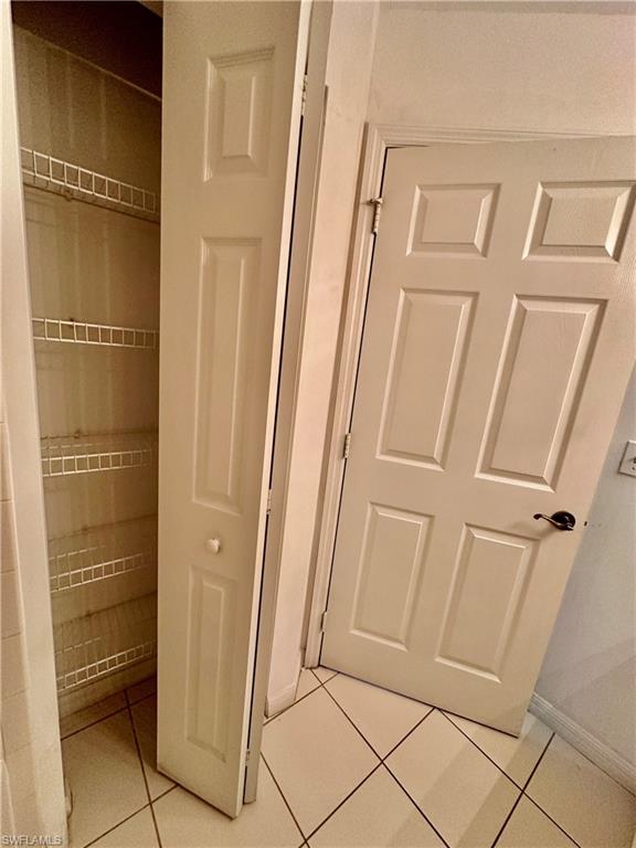 Tiled Kitchen Pantry and Garage Entry Door