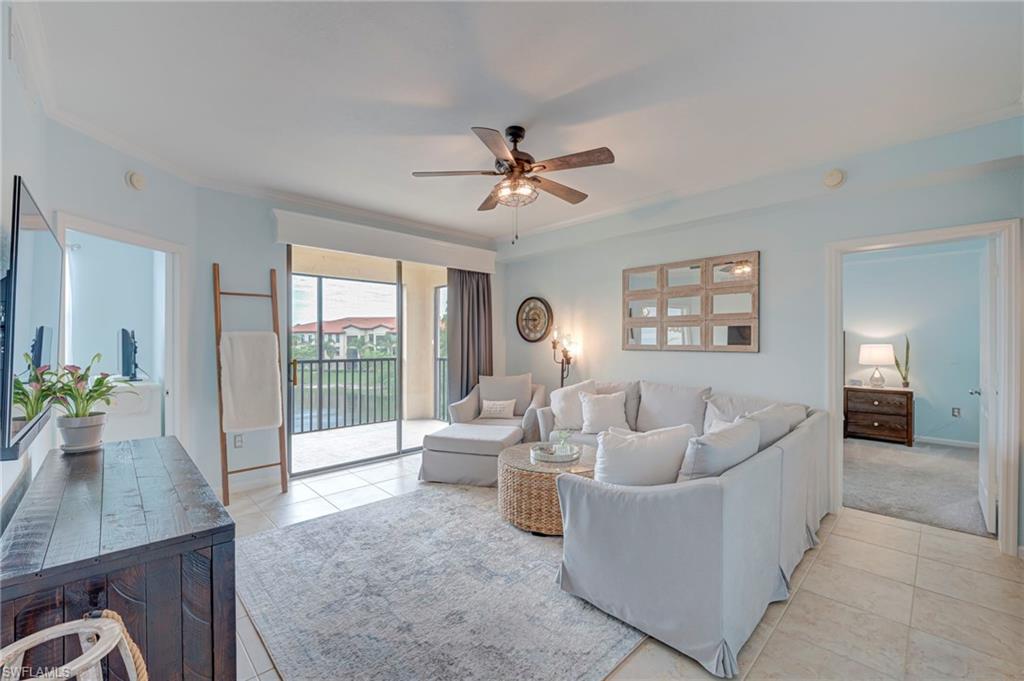 Living Room w/ View of Lanai & Lake w/ Fountain