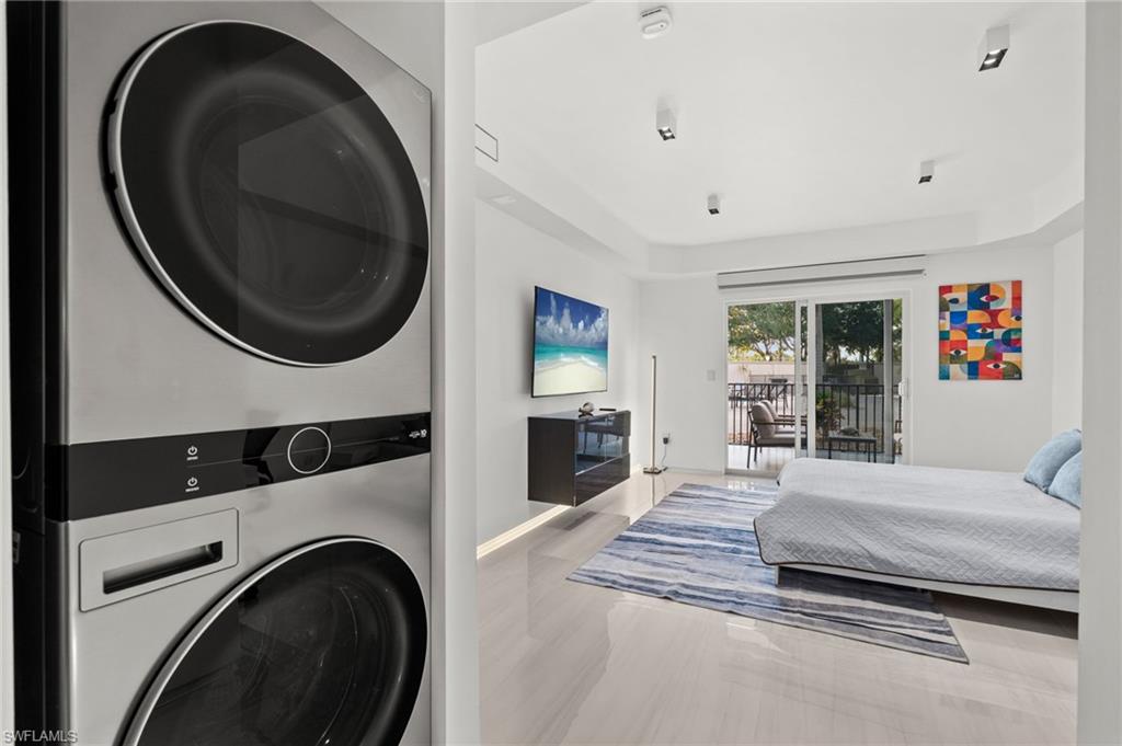 Modern stacked laundry appliances with a clean, contemporary design