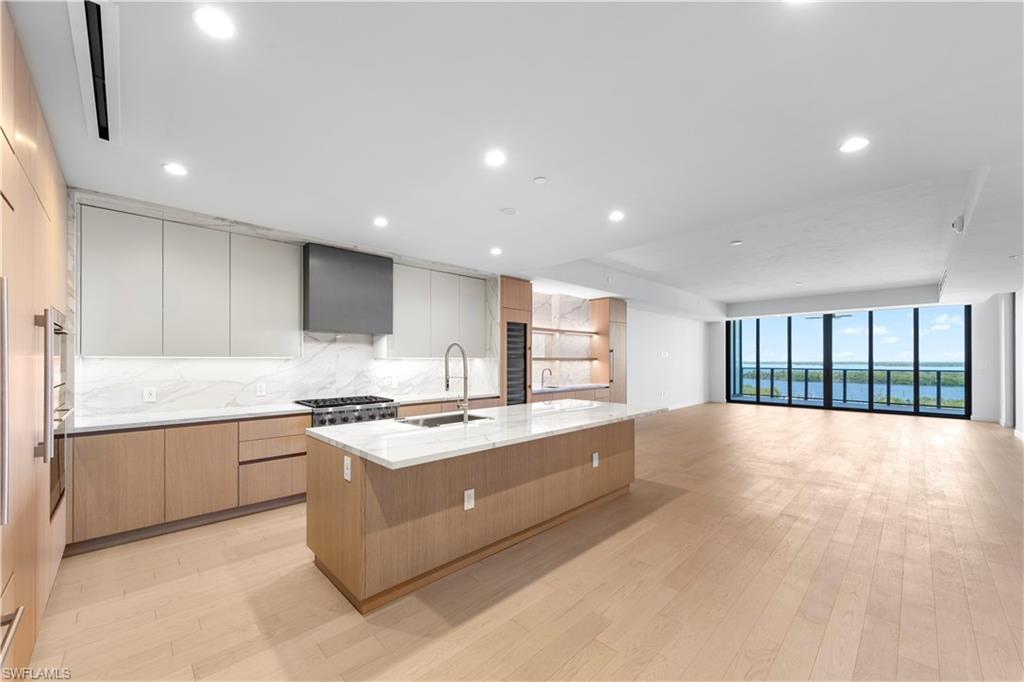 Italkraft Cabinetry, Polished Porcelain, ,Task Lighting, West Bar, 10' Island, 102 Bottle Dual Zone Wine Fridge
