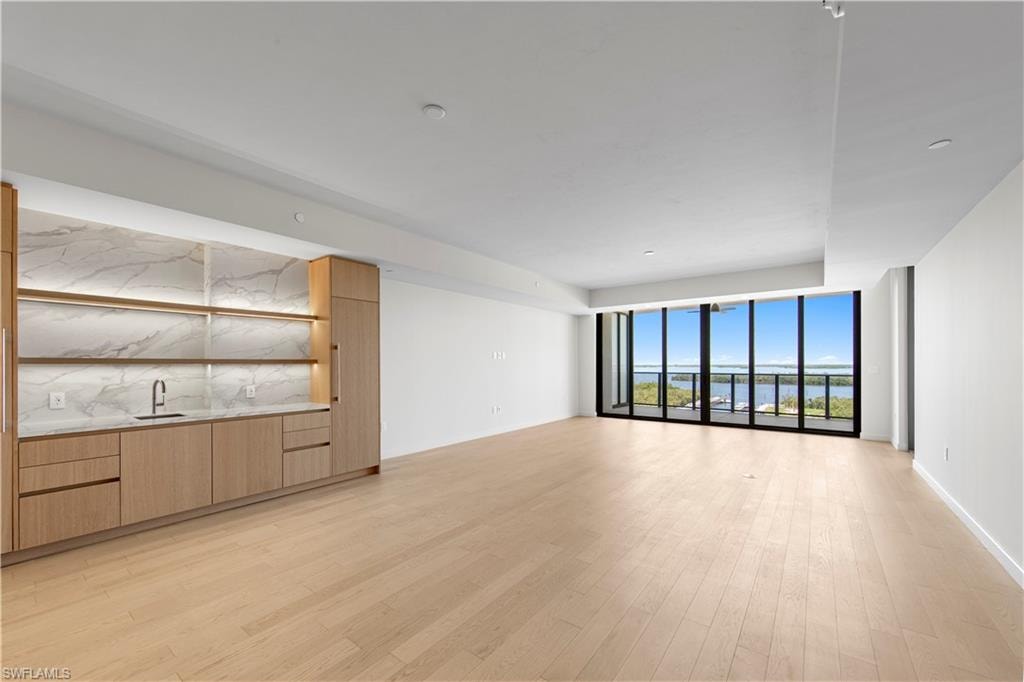 Italkraft Cabinetry, Polished Porcelain, ,Task Lighting, West Bar, 10' Island, 102 Bottle Dual Zone Wine Fridge