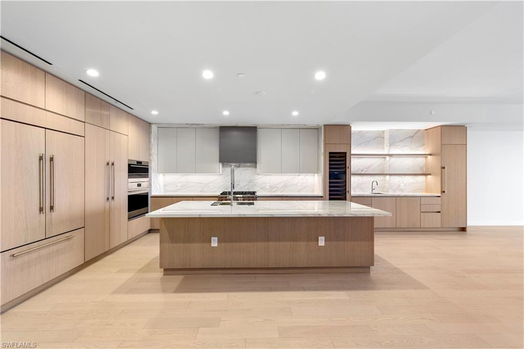 Italkraft Cabinetry, Polished Porcelain, ,Task Lighting, West Bar, 10' Island, 102 Bottle Dual Zone Wine Fridge
