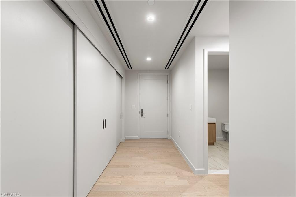 Entry Hallway with Closet and Powder Room