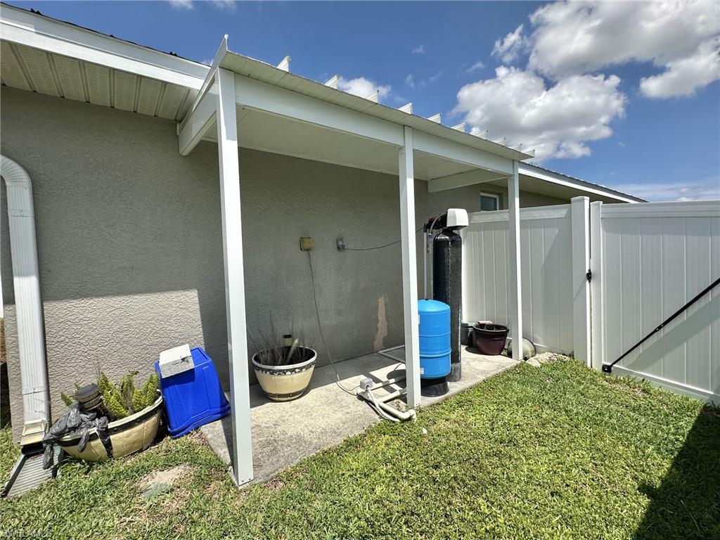 2308 water treatment system /storage with canopy and fencing gate
