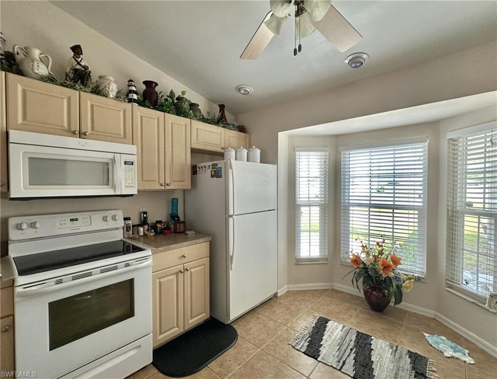 2308 Kitchen with new wind ijmpact windows