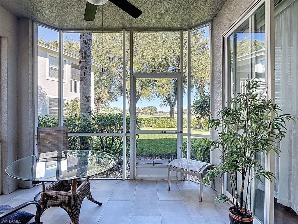 Sunroom / solarium with ceiling fan and plenty of natural light