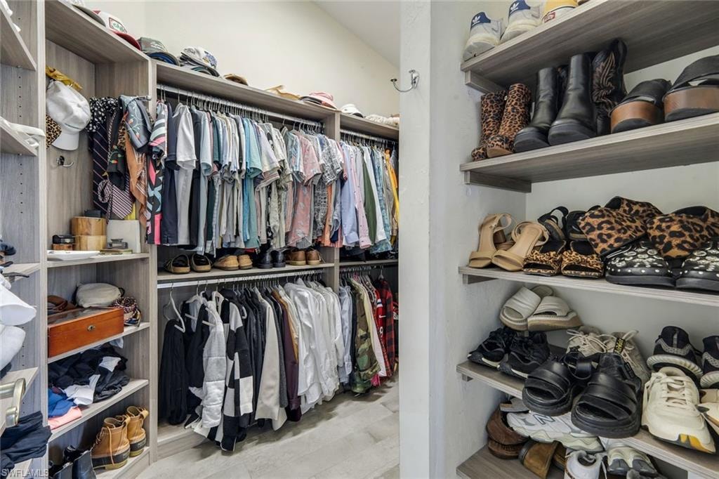 Primary suite features large custom closet.