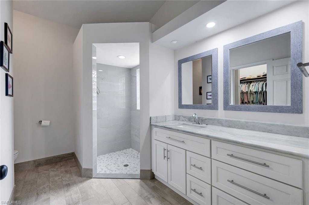 En suite primary bathroom has been beautifully updated.