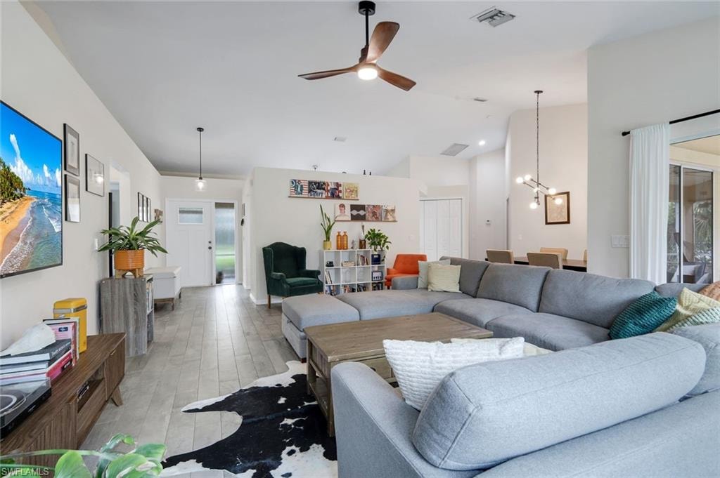 View of entryway from living room. Primary suite is located just off the main living area.