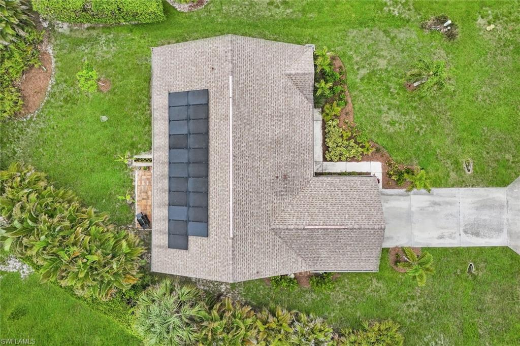 Aerial view of home and oversized lot!