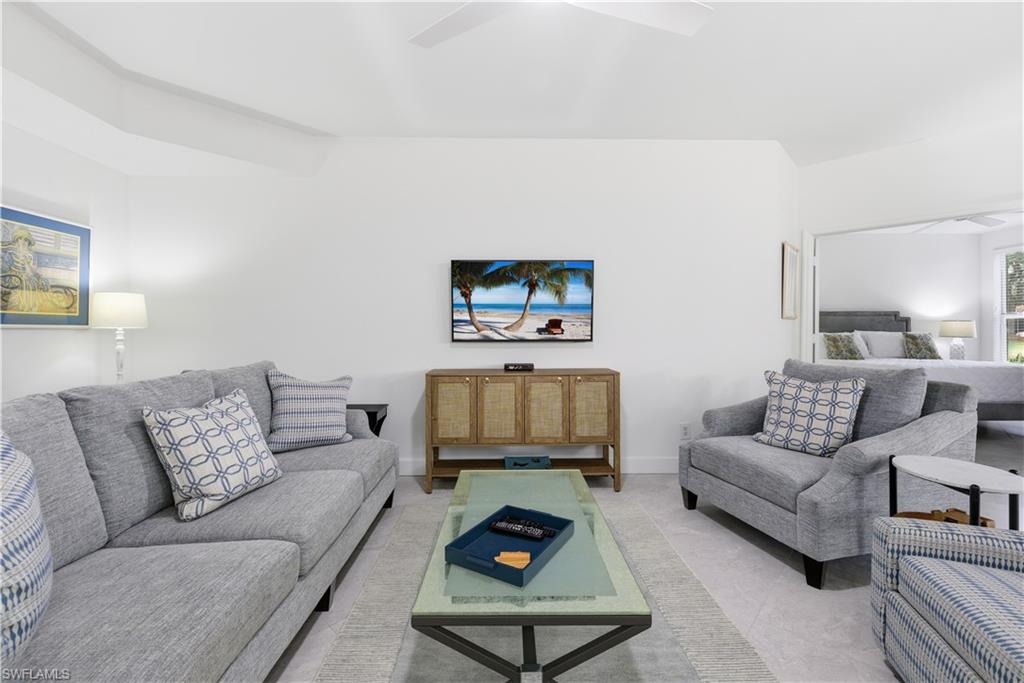 Living room featuring a ceiling fan