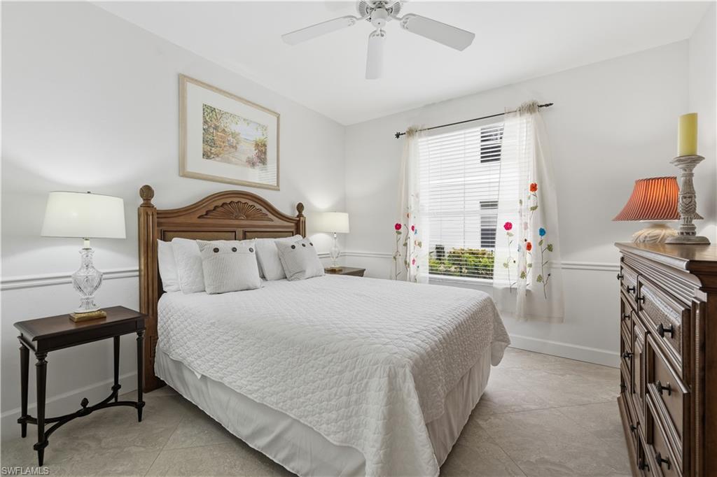 Bedroom featuring ceiling fan and light tile patterned flooring