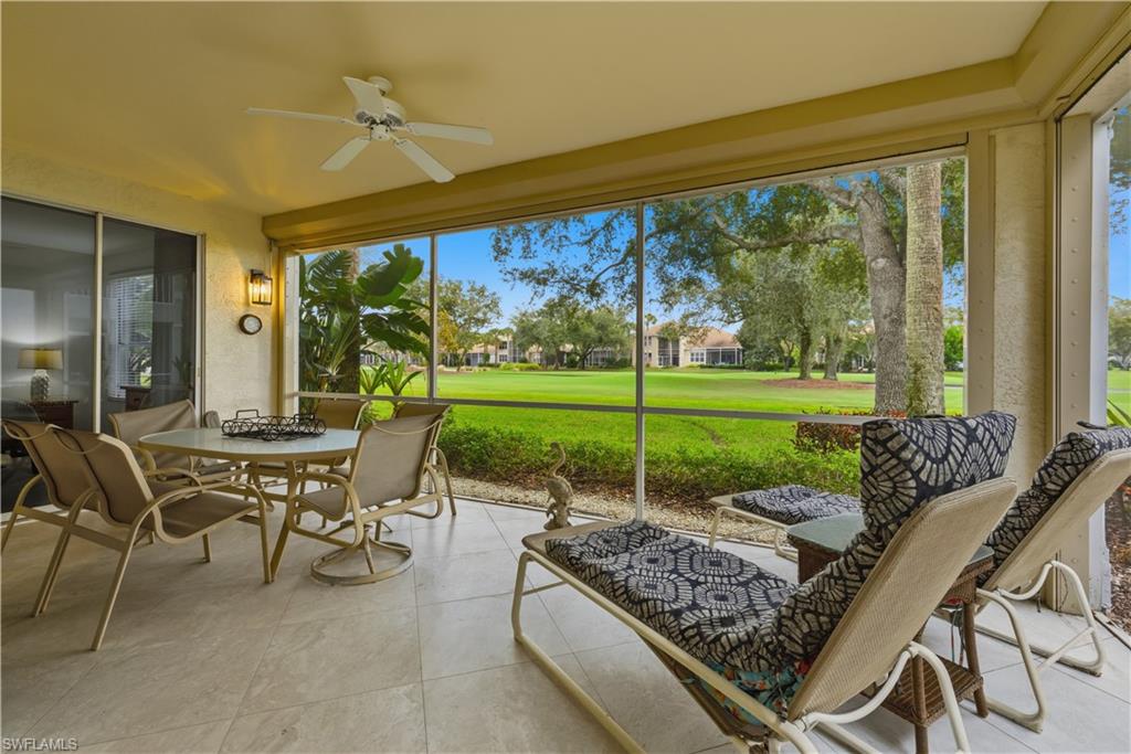 Sunroom / solarium with a ceiling fan, outdoor dining area, and healthy amount of natural light
