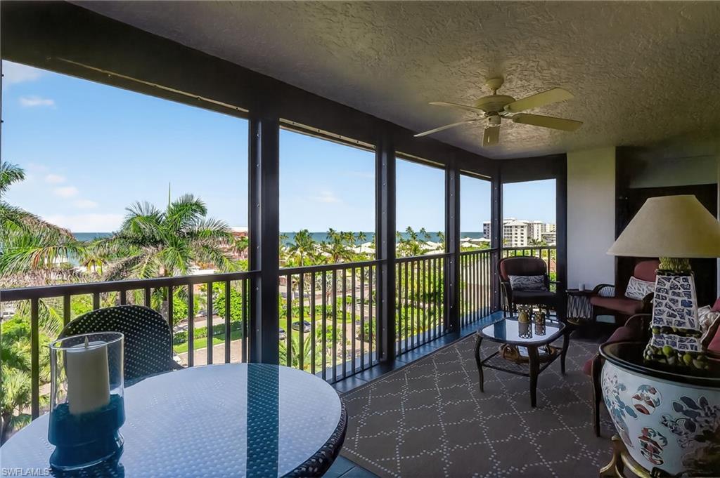 Screened Balcony with incredible Sunset views, casual seating and dining space