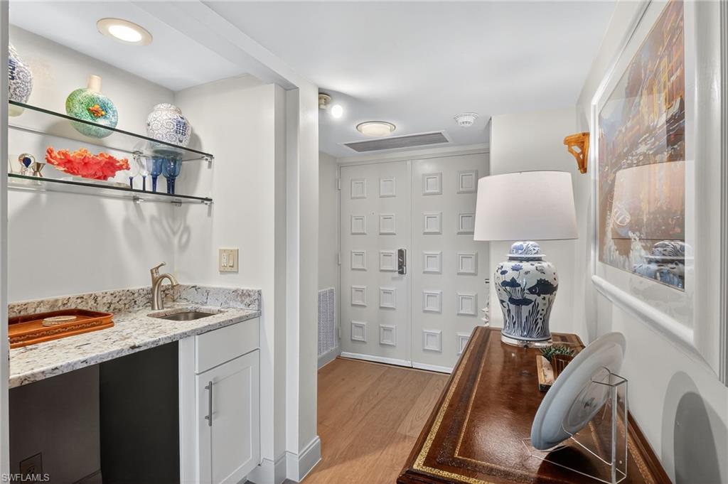Entry foyer, Hallway and wet bar