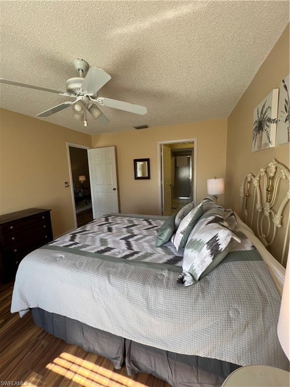 Bedroom featuring wood-finish flooring, a ceiling fan with integrated lighting, and neutral wall tones
