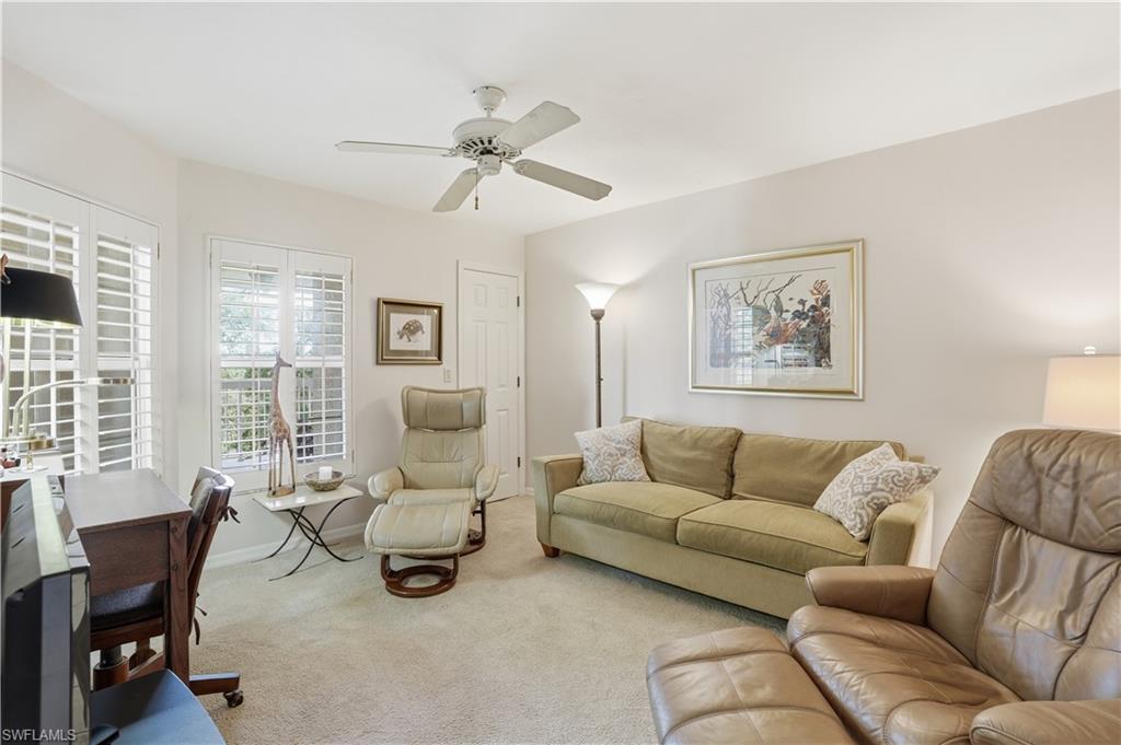 Comfortable den, ideal for a home office or extra living space.