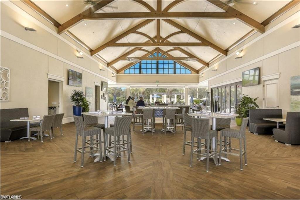 The Breezeway bar and restaurant overlooks a gorgeous resort style pool, also available for use with club membership.