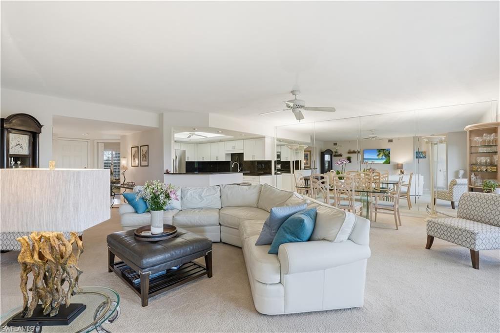 The living, dining, and kitchen areas flow together seamlessly.