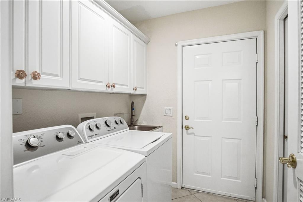 Large laundry room located in residence.