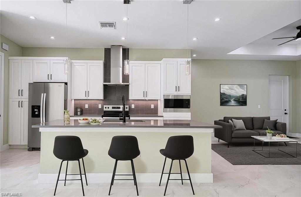 Virtually Staged Kitchen and second Living Area