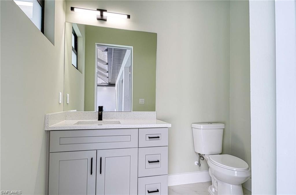 Bathroom accessible from the Lanai/Pool Deck