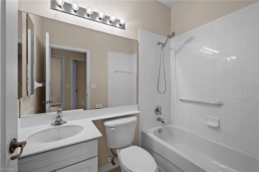 Full bath featuring bathing tub / shower combination and vanity