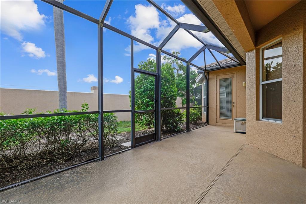 Screened lanai with plenty of natural light and covered area