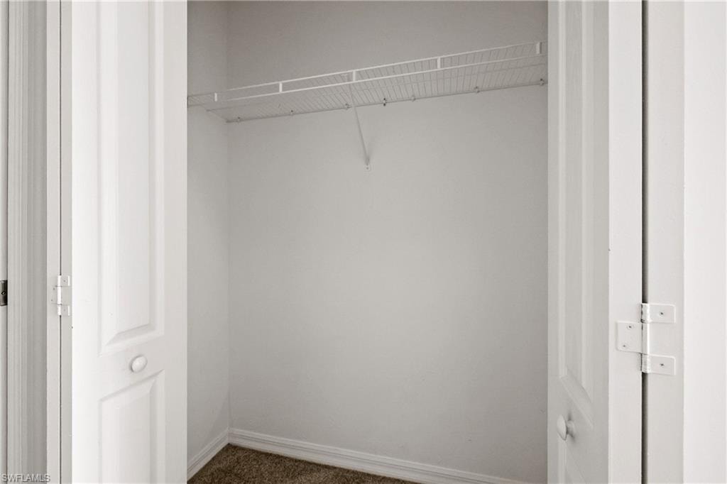 View of primary bedroom's 2nd closet
