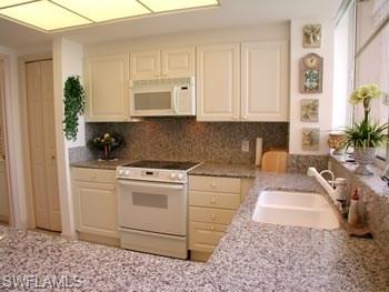 7117 Pelican Bay BLVD 1202 photo 6