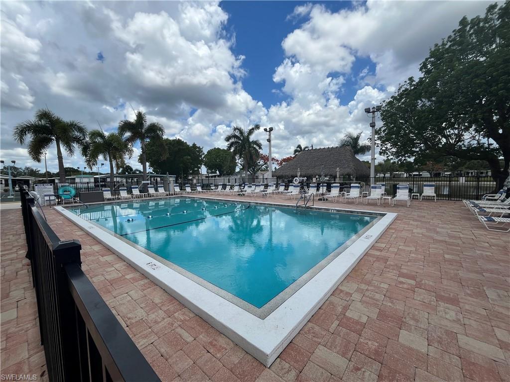 Outdoor swimming pool with ample seating