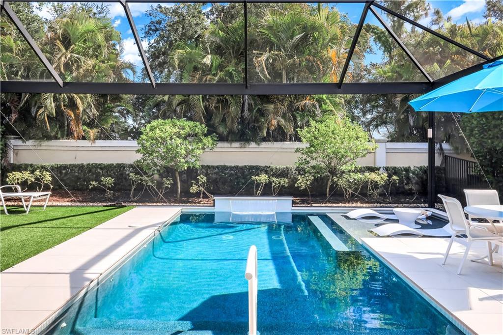 Pool with sundeck and enclosed lanai