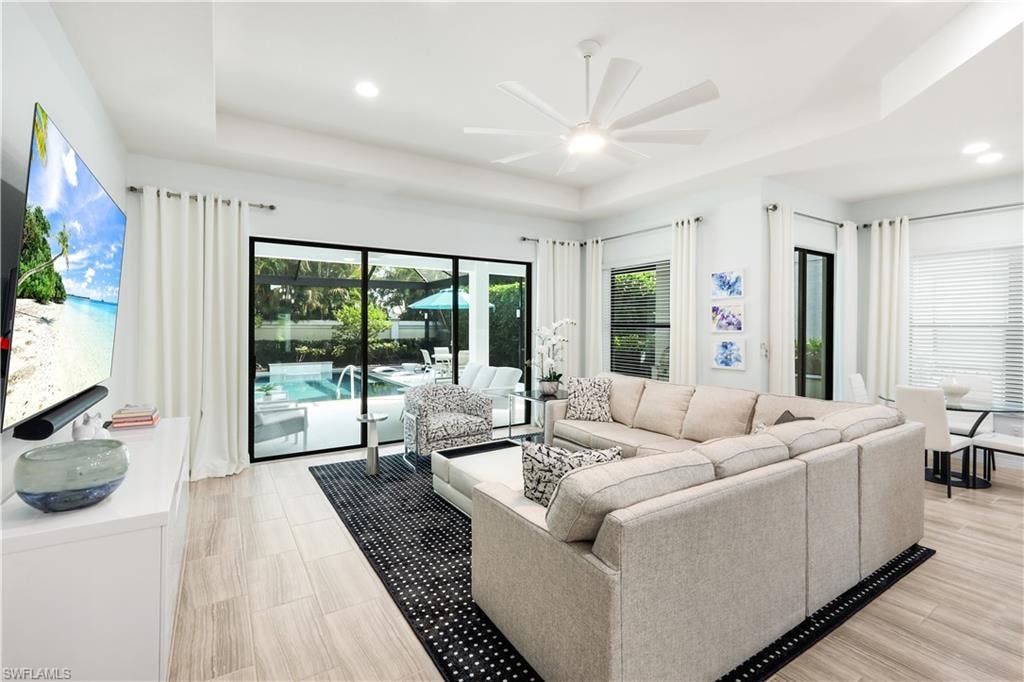 Great room with view and access to the lanai with pool and breakfast nook area.
