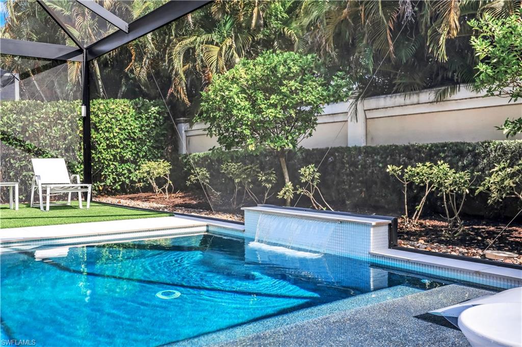 Pool with sundeck and enclosed lanai