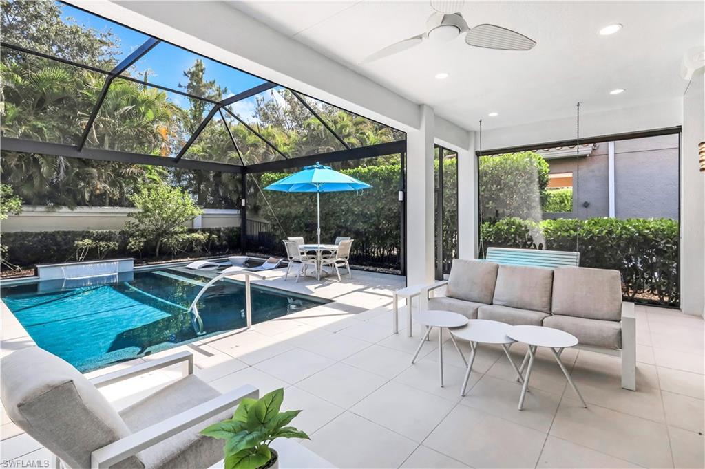 Fabulous lanai with under cover area, large pool, lounge area, electric hurricane screens and built-in kitchen (not shown).